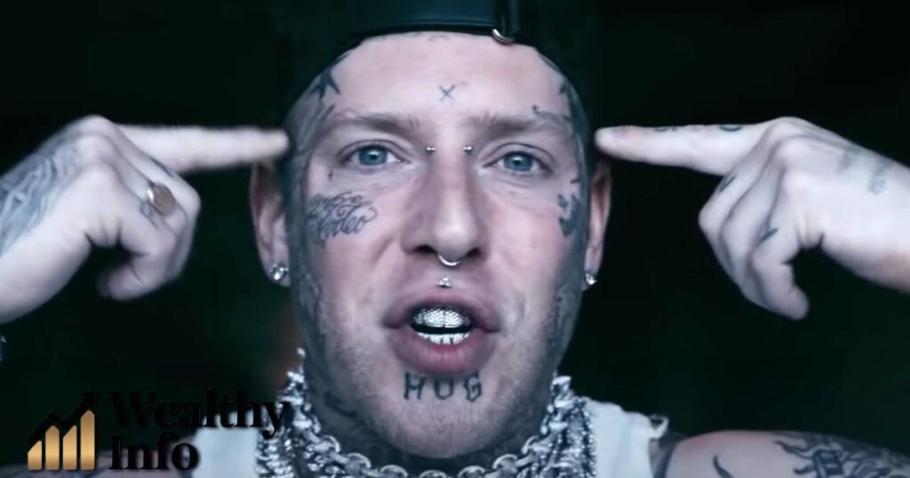 Tom MacDonald Net Worth – rapper with tattoos and grillz.