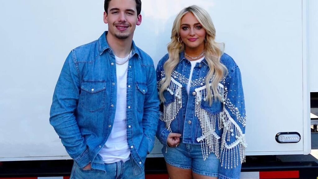 Noah Thompson standing with his wife, both wearing matching denim outfits, highlighting Noah Thompson’s relationship life.