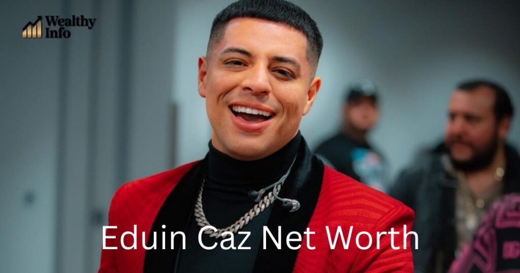 Promotional image used for an article discussing Eduin Caz net worth, showing a smiling man in a red jacket indoors.