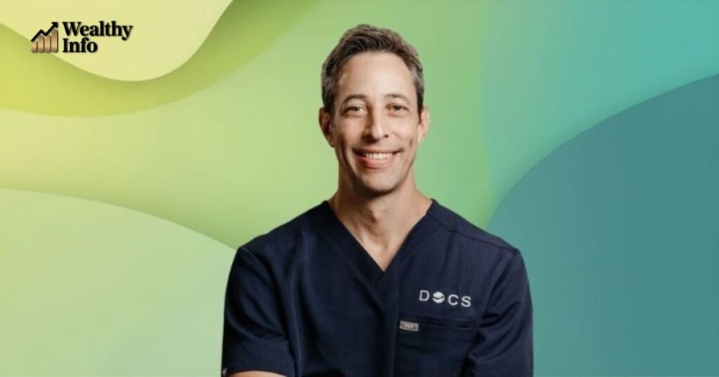 Justin Saliman Net Worth profile photo in medical uniform