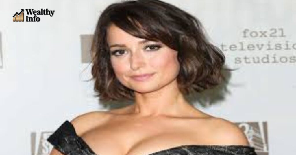 Actress-style portrait of Milana Vayntrub at a media event.